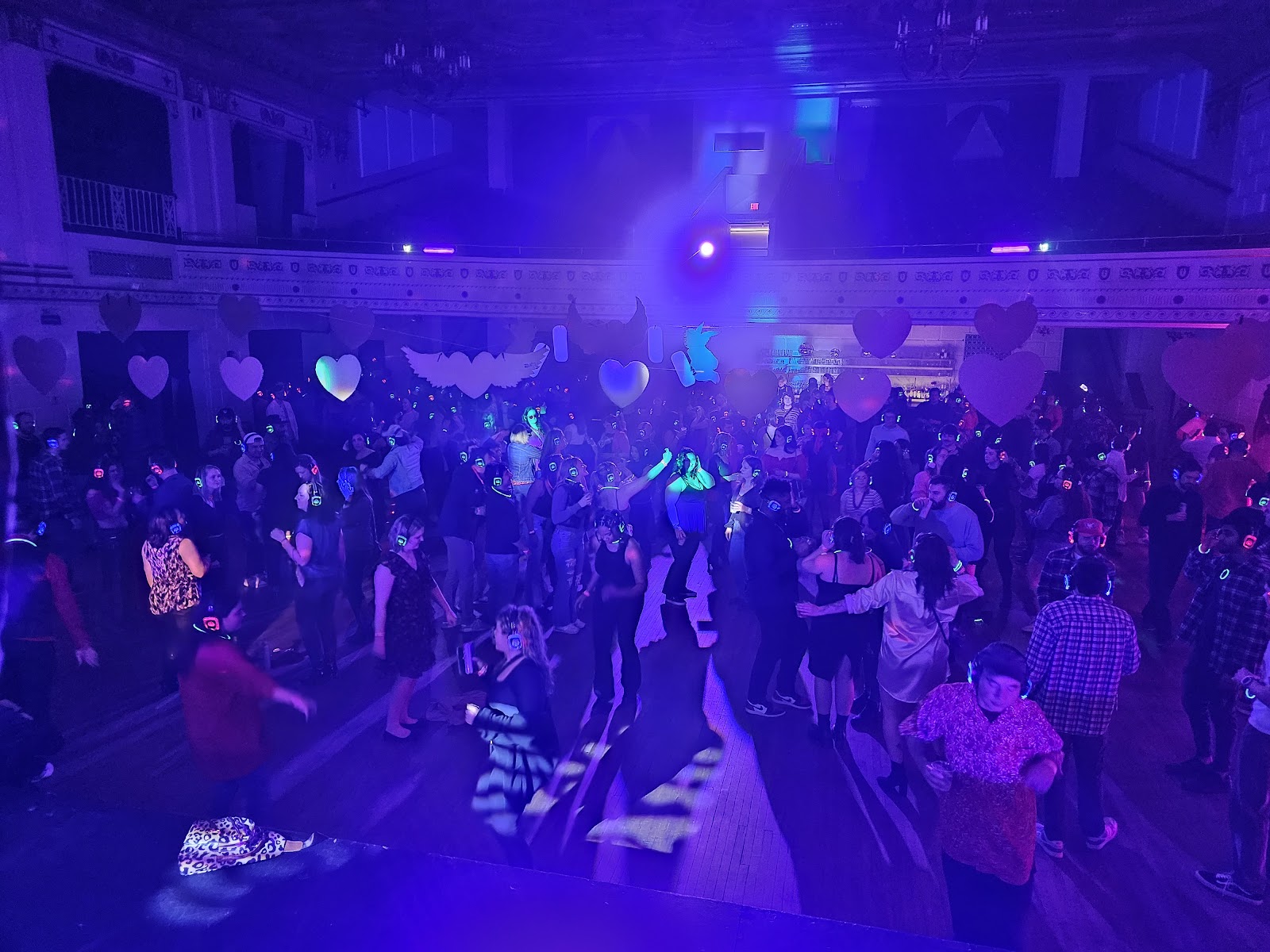 SE2 Silent Disco photo showing party guests on a silent disco dance floor with guest reaction, asset WK7QYW.
